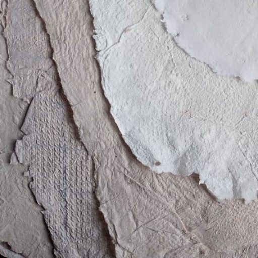 Layers of hand made paper in a variety of textures and shades.